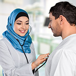 Arab Doctor examining patient-thumb
